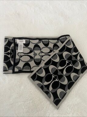 Coach Signature Wool Blend
Metallic Logo Scarf Black and Gray Patterned Scarf